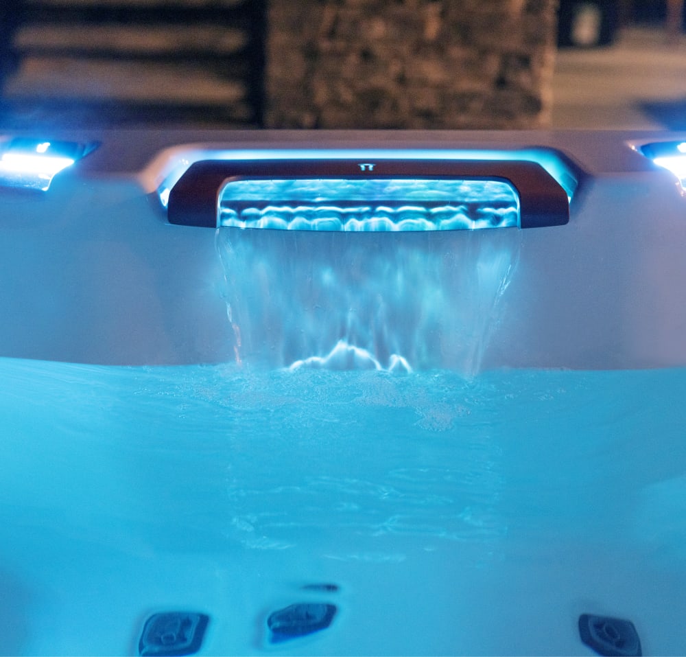 A waterfall in a hot tub.